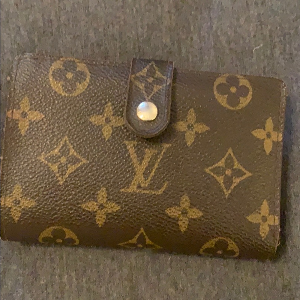 Authentic LV wallet, some minor scratches and used.